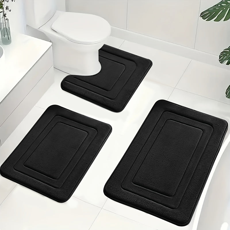 Sklisikker baderomsmatte i svart memory foam. 3-delt sett for badet, inkludert dusjmatte.