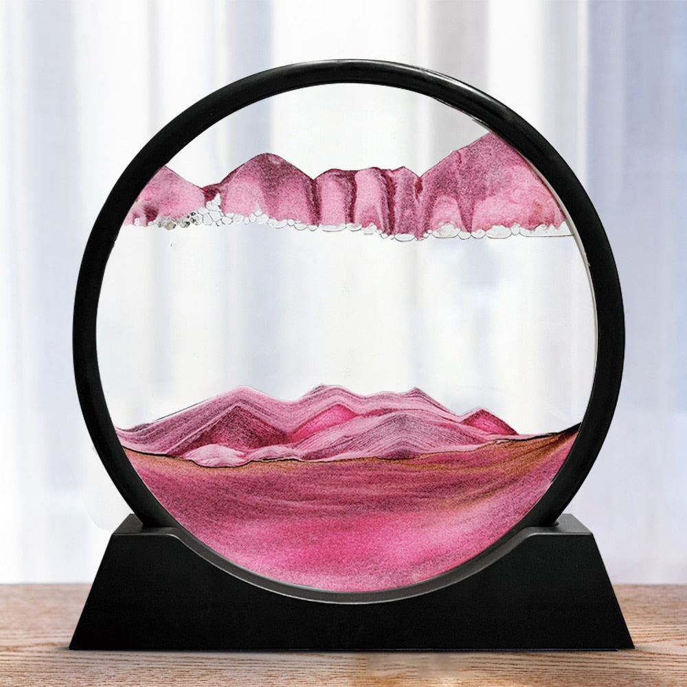 Transparent sandkunst-dekorasjon som viser dynamiske og avslappende sandbilder.