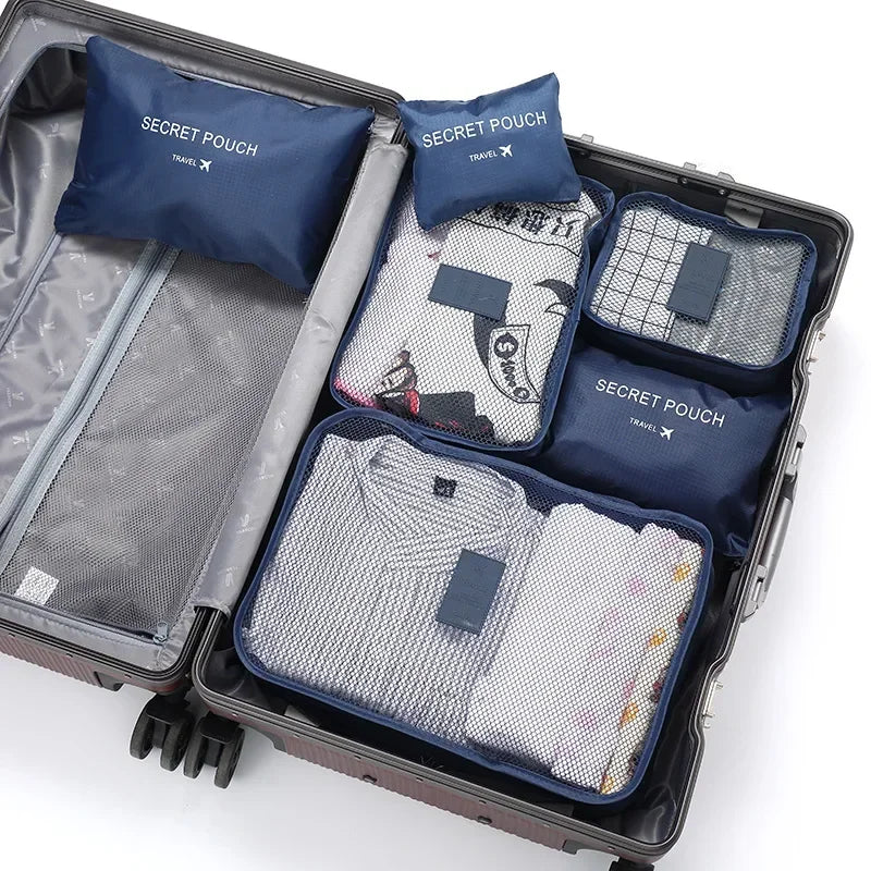 "6-teiliges wasserfestes Kofferorganizer Set, variabel in Größe, aus robustem Oxford-Stoff, ideal für Reisen."