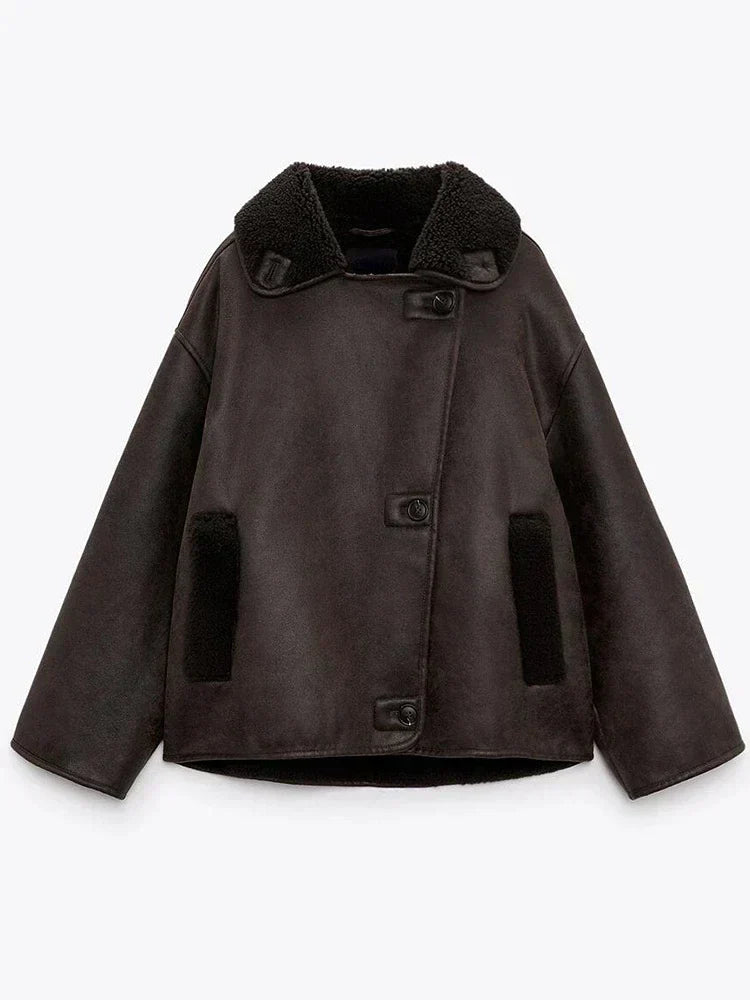 "Damen Lederjacke Vintage Stil, klassisch geschnitten, aus hochwertigem Leder, Retro-Charme, vielseitig kombinierbar."