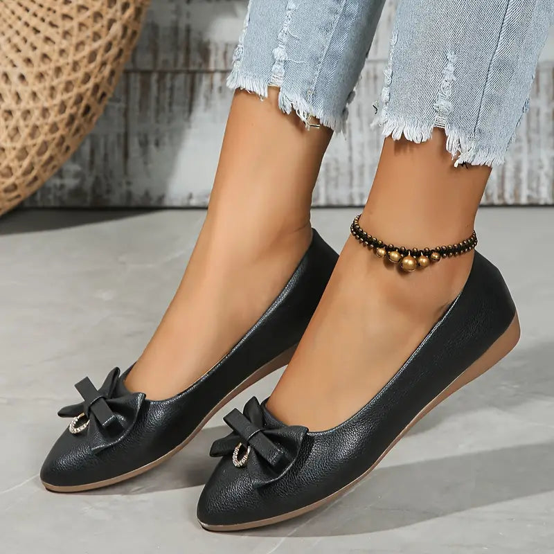 "Damen Schleifen Doll Schuhe in elegantem Design mit Schleifenelement für stilvolle Auftritte, seitliche Ansicht."
