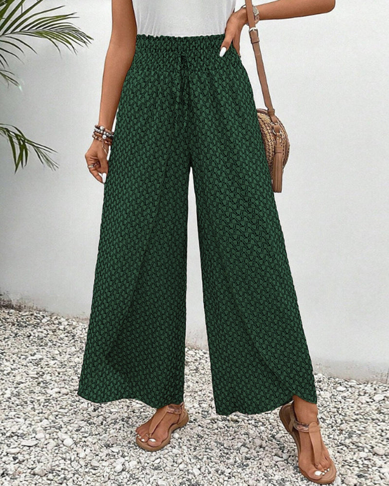 "Damen Sommerhose mit hoher Taille, geometrischer Druck, schmeichelhafte Silhouette, stilvoll und komfortabel, Seitenansicht"