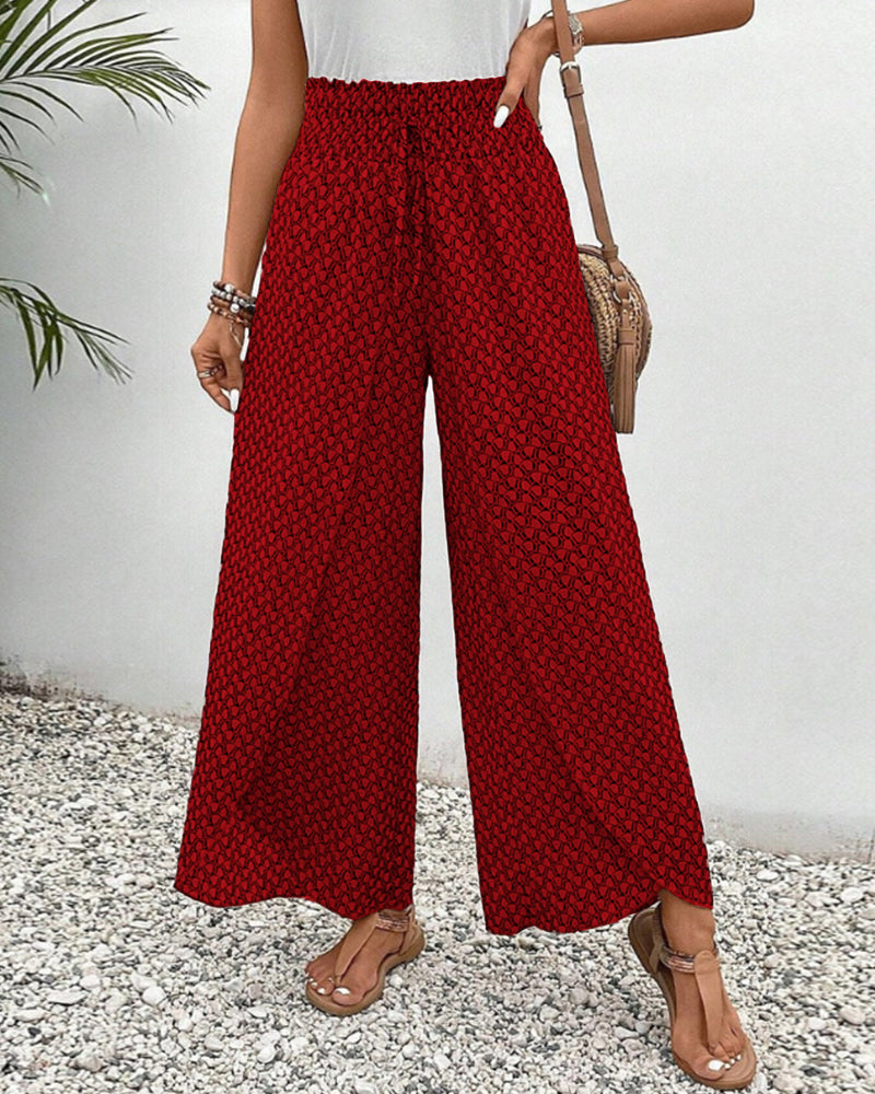 "Damen Sommerhose mit hoher Taille, geometrischer Druck, schmeichelhafte Silhouette, stilvoll und komfortabel, Seitenansicht"