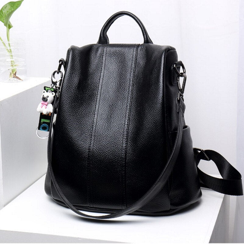 "Diebstahlsicherer Lederrucksack für Damen, braun, flexibel tragbar mit verstecktem Rückenzugang und schnittfestem Design."