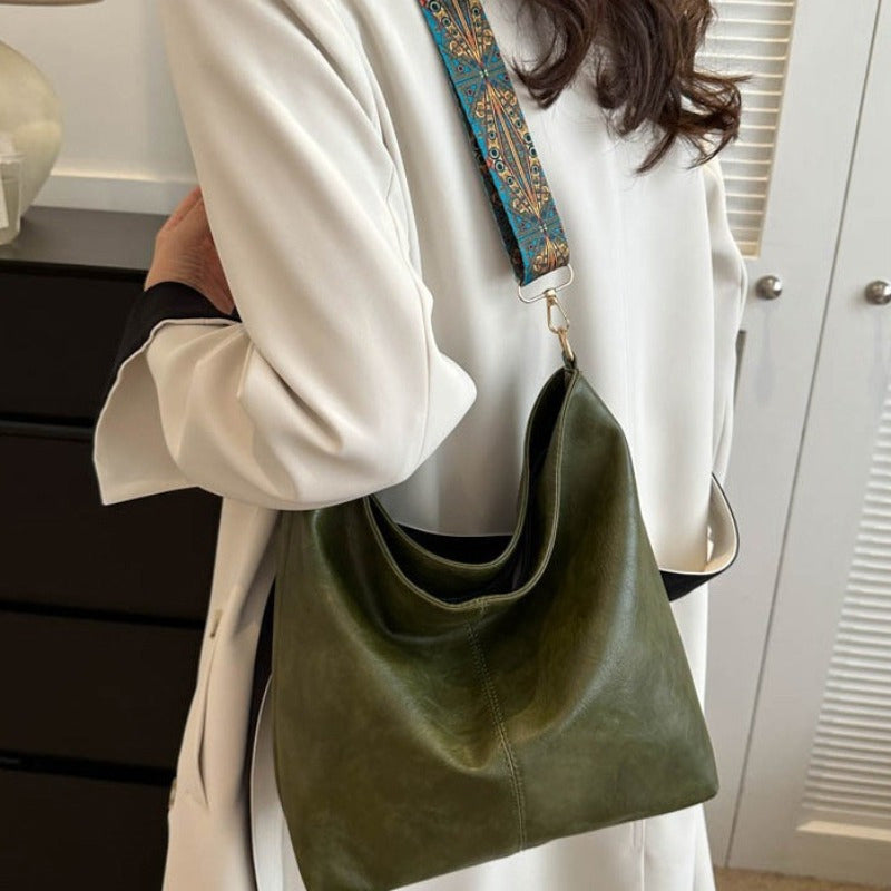 Elegante Damen Schultertasche in Vintage-Optik, Vorderansicht, beige Farbe, stilvoll, praktisch, robustes PU-Material.