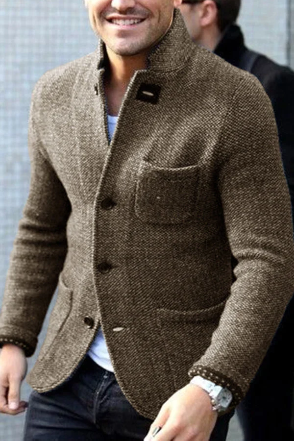 "Eleganter grauer Herrenblazer mit Knopf-Design und schmaler Passform, ideal für Büro und formelle Anlässe."