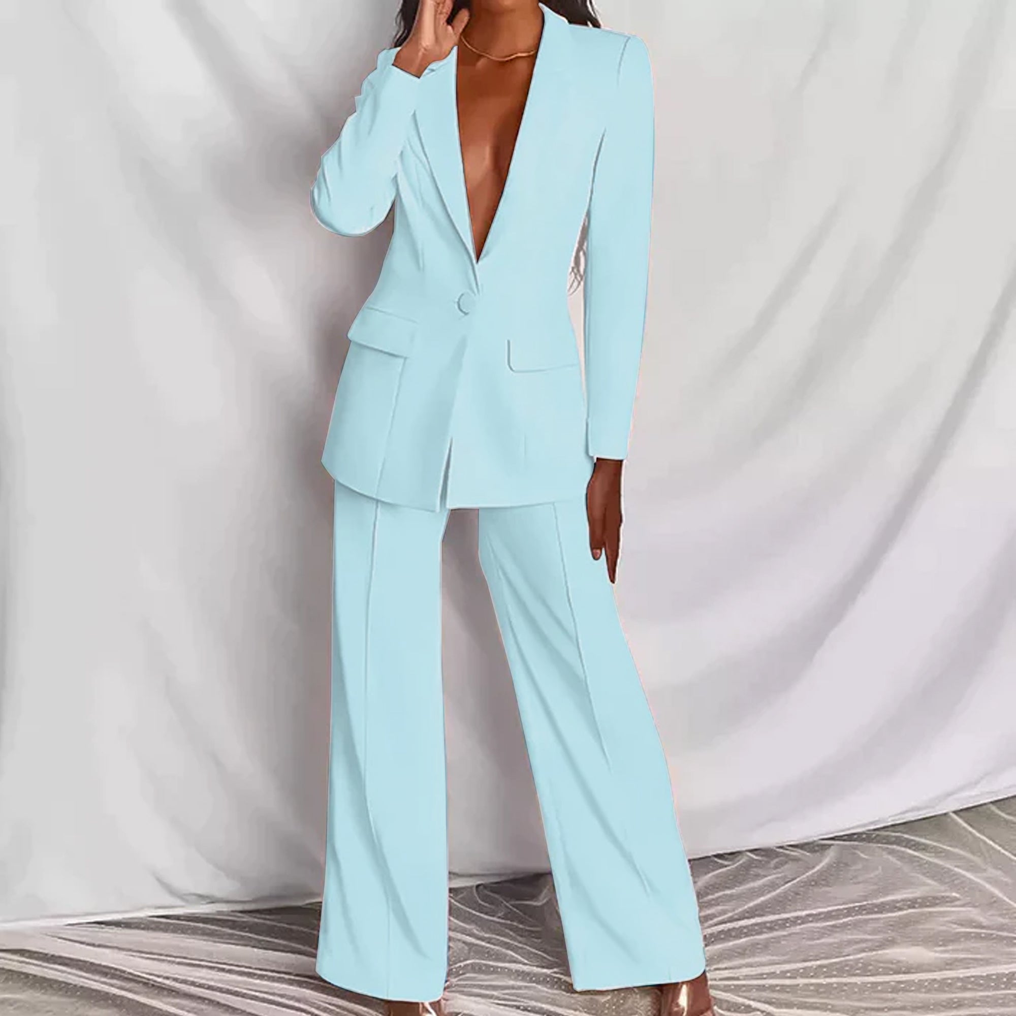 "Elegantes Damen Set: Weißer Blazer mit Seitentaschen und passende Hose, ideal für Business und formelle Anlässe"