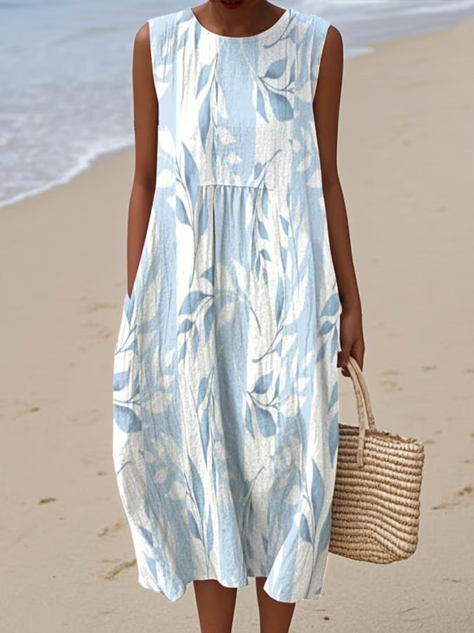 "Elegantes Damenkleid mit Vintage Blumenmuster, verspielt, luftig und ideal fĂĽr den Sommer, in Retro-Stil."