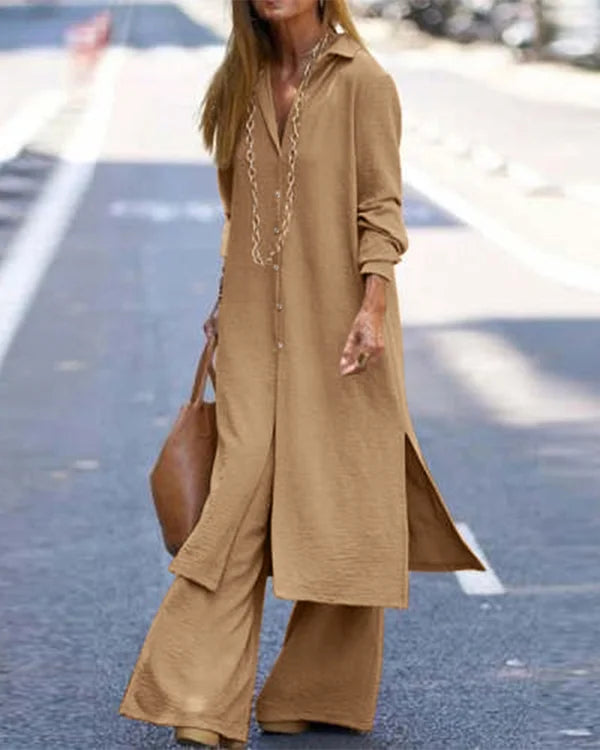 Figurbetontes Damenhemd in WeiĂź, langes Design, schlanke Silhouette, schmeichelhafter Schnitt, eleganter Look.