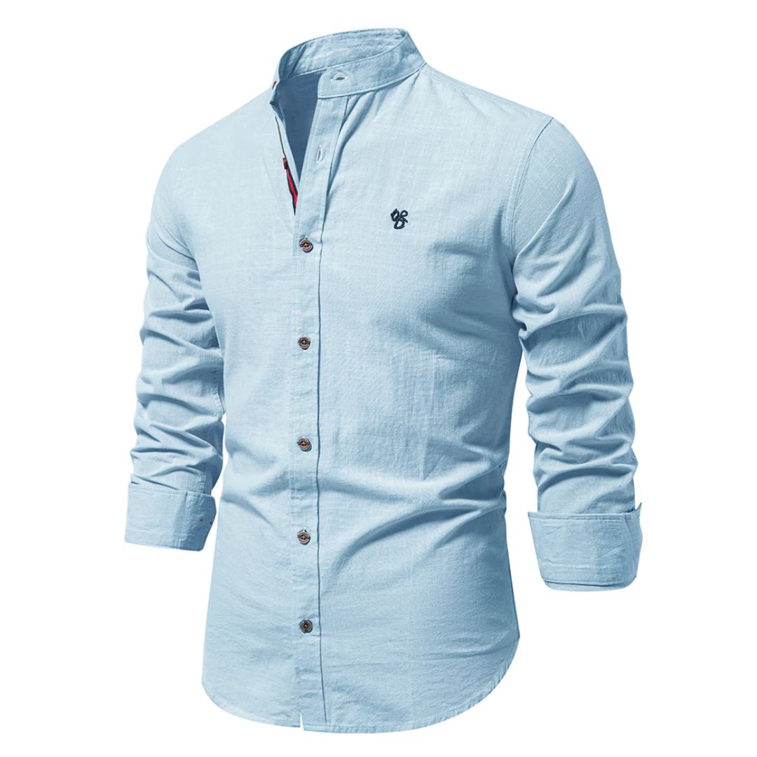 "Klassisches navyblaues Herren-Langarmtrachtenhemd, atmungsaktiv und aus 100% Baumwolle, ideal für Alltag und Anlässe."