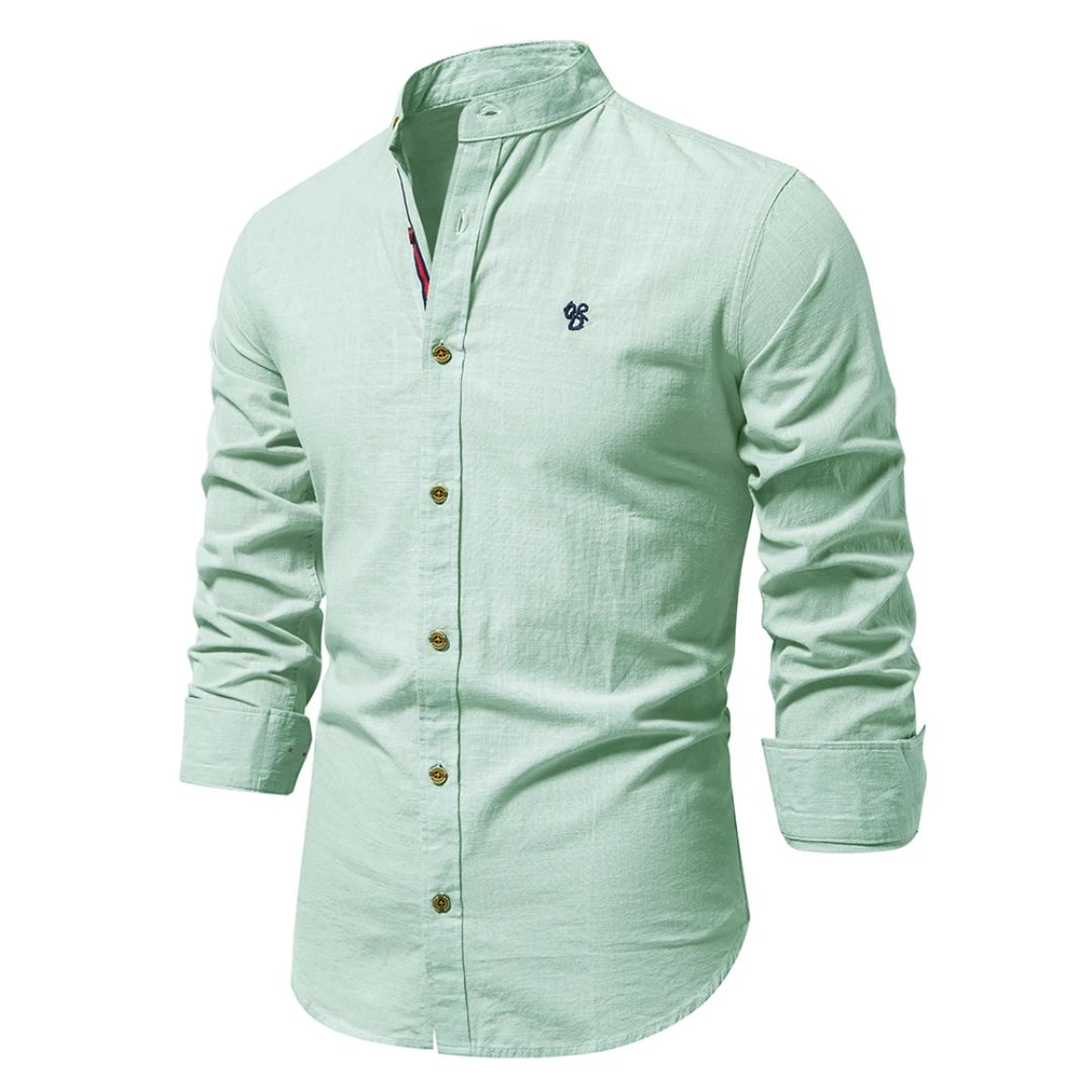 "Klassisches navyblaues Herren-Langarmtrachtenhemd, atmungsaktiv und aus 100% Baumwolle, ideal für Alltag und Anlässe."