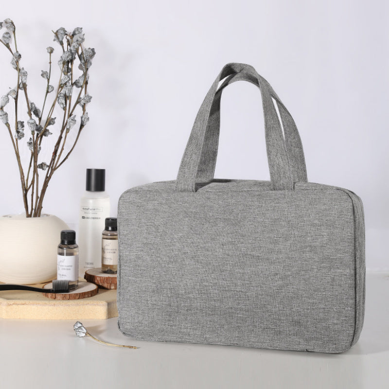 "Kompakter, wasserabweisender Reise-Kosmetik-Organizer mit Hanf-Optik, 4 Fächern, transparenten Seiten und Haken."