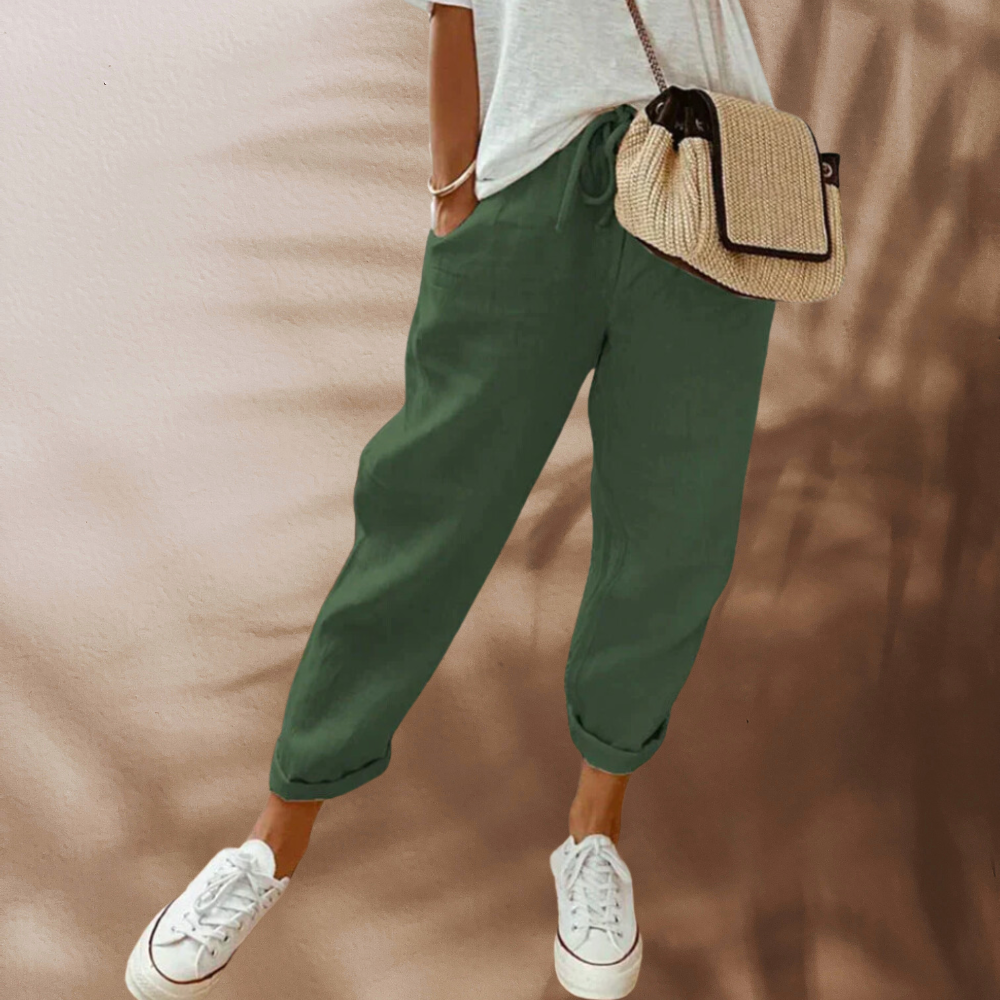 "Lässige Leinenhose in Beige, leichtes Material, Seitenansicht, ideal für Komfort und Stil, verschiedene Farben verfügbar"