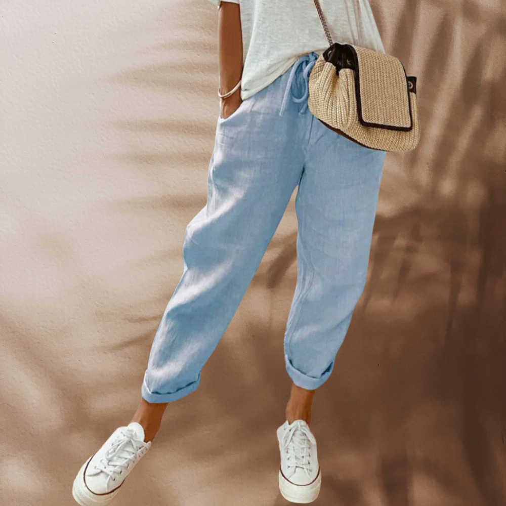 "Lässige Leinenhose in Beige, leichtes Material, Seitenansicht, ideal für Komfort und Stil, verschiedene Farben verfügbar"