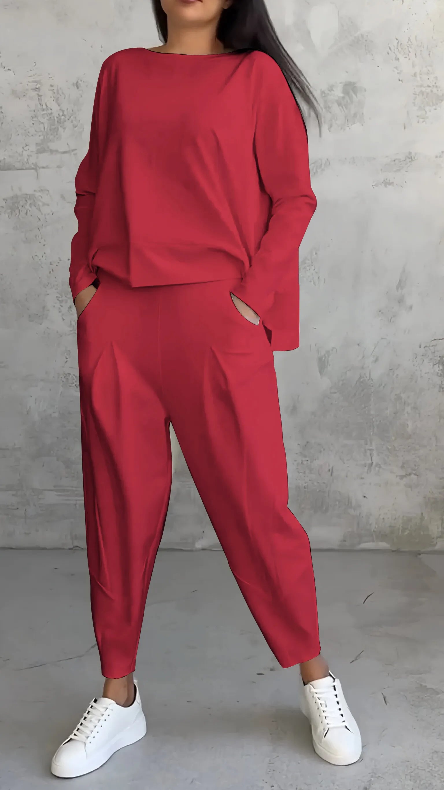 "Lässiges Damen Zweiteiler-Set mit Langarmshirt und Haremshose, ideal für Freizeit und Komfort, in lockerer Passform."