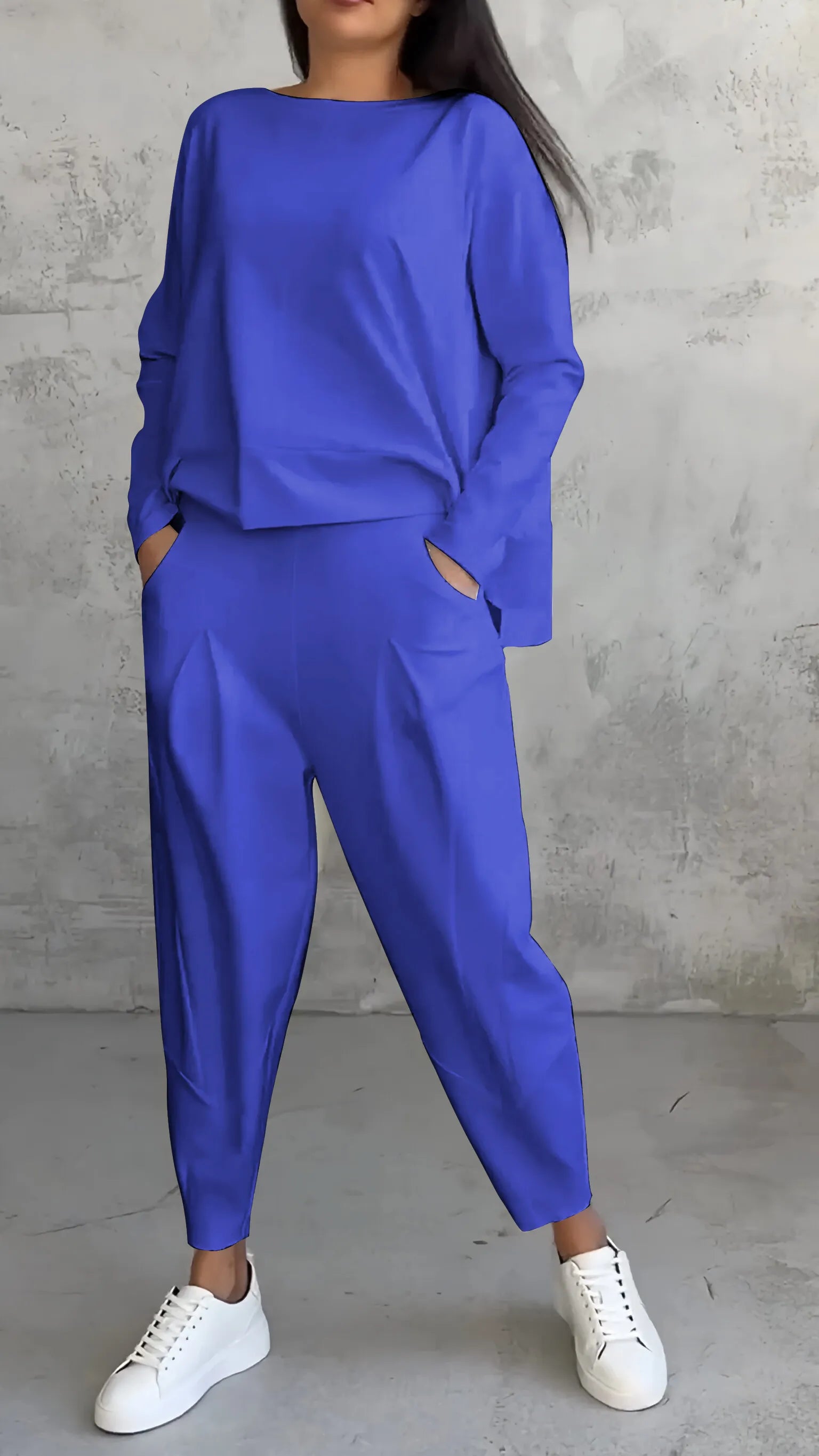 "Lässiges Damen Zweiteiler-Set mit Langarmshirt und Haremshose, ideal für Freizeit und Komfort, in lockerer Passform."