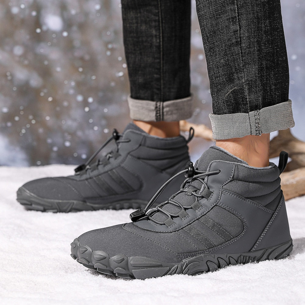 Rutschfeste Winter Barfußschuhe, warmes Innenfutter, hohe Sohle, ideal für Schnee und kalte Bedingungen.