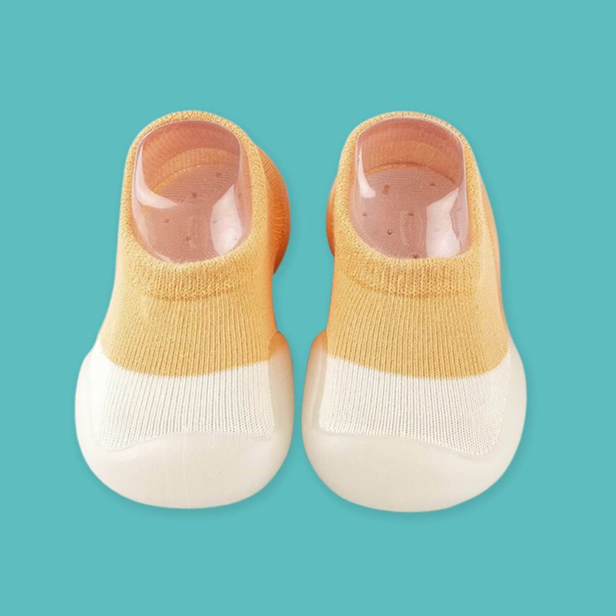 Rutschfeste, atmungsaktive Babyschuhe aus flexiblem, leichtem Material für natürliche Fußentwicklung und sicheren Halt.