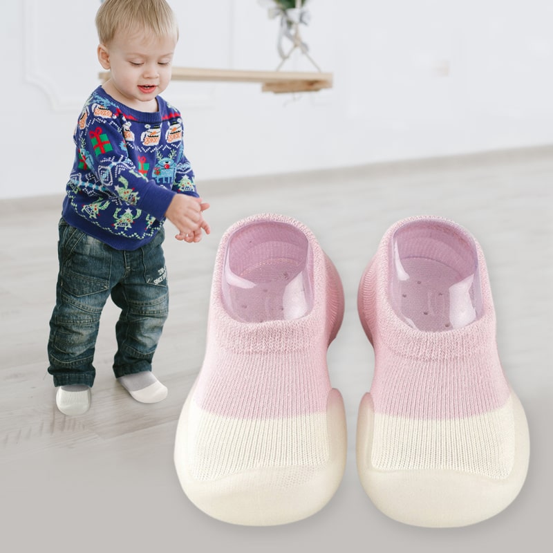 Rutschfeste, atmungsaktive Babyschuhe aus flexiblem, leichtem Material für natürliche Fußentwicklung und sicheren Halt.