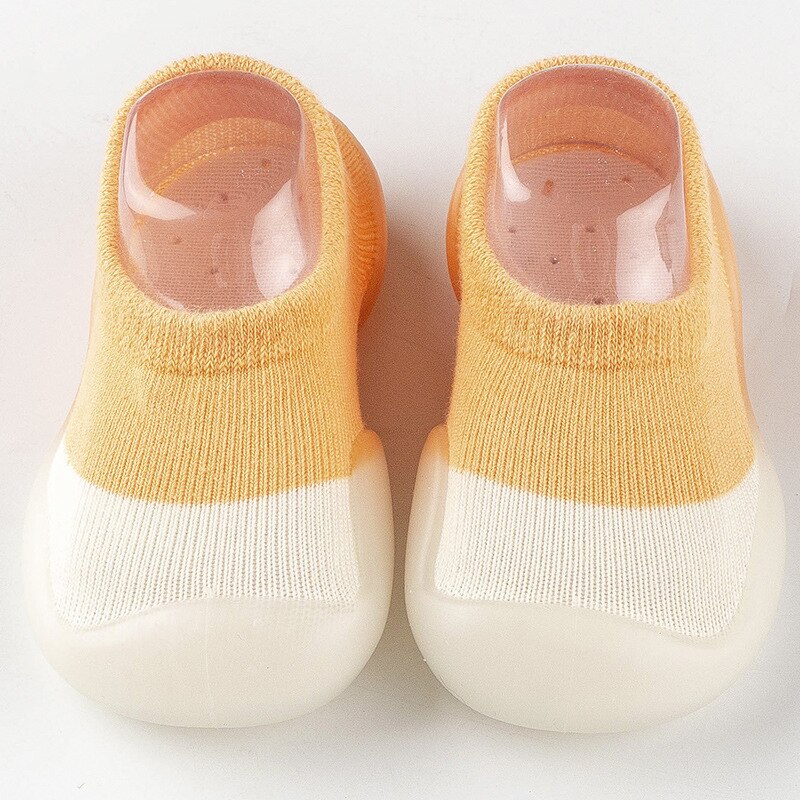 Rutschfeste, atmungsaktive Babyschuhe aus flexiblem, leichtem Material für natürliche Fußentwicklung und sicheren Halt.