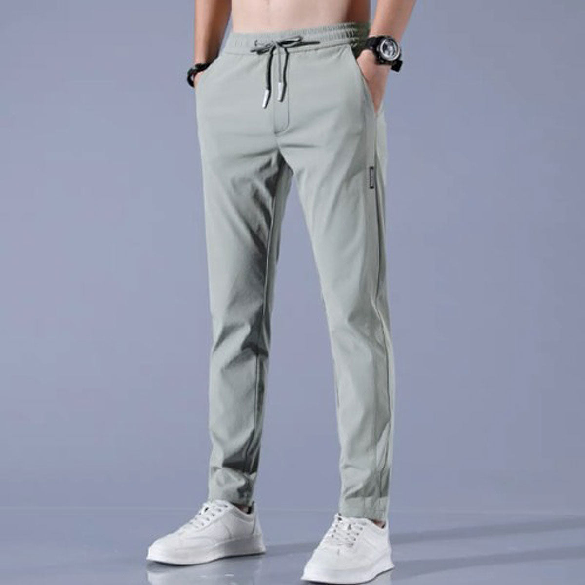"Schnelltrocknende Sporthose für Damen, mit Stretch, schlanke Passform, mittelhoher Bund, graue Farbe, vielseitig einsetzbar.