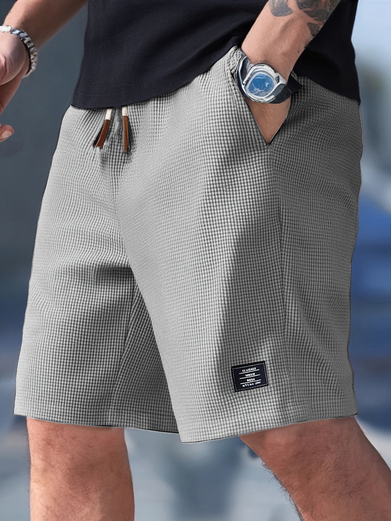 "Stylische Herren-Casualshorts mit strukturiertem Design und Kordelzug, ideal für jeden Anlass und hohen Tragekomfort."