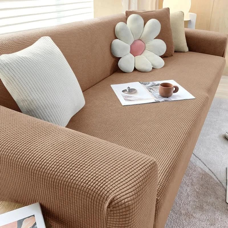 "Wasserdichter Sofabezug aus Jacquard-Stoff in Beige, schützt vor Flecken, stilvolles Design, für Haustiere geeignet."