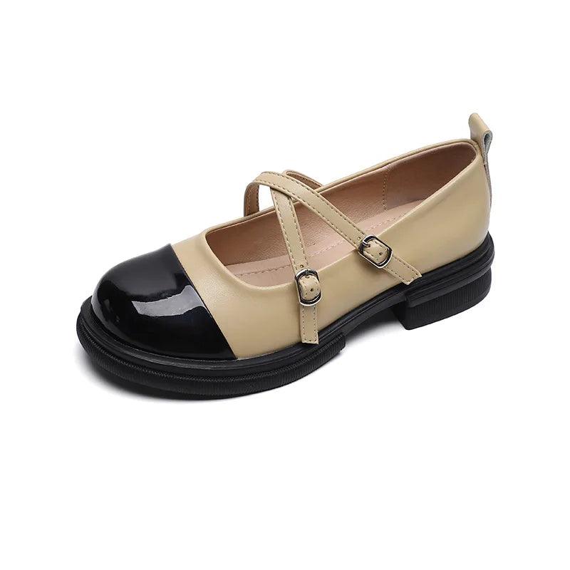Zweifarbige Mary-Jane-Flats mit Doppelriemen, schwarze Zehenkappe, cremefarbenes Obermaterial, Damenschuh elegant und modern.