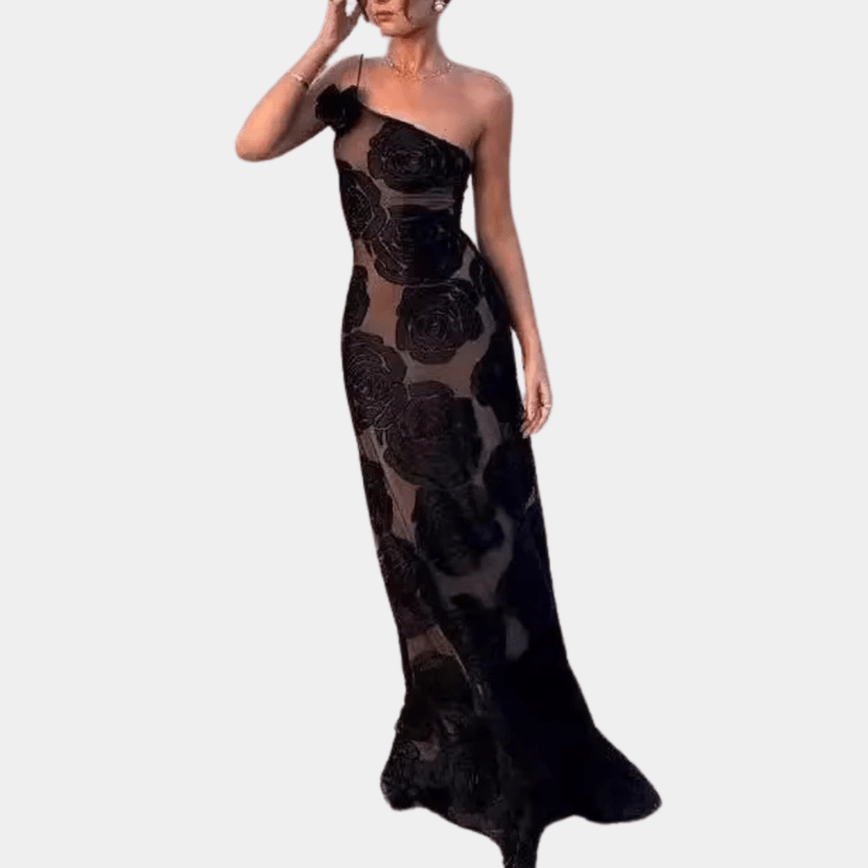 Svart blomstret kvinnekjole med flatterende snitt, allsidig og elegant for alle anledninger.