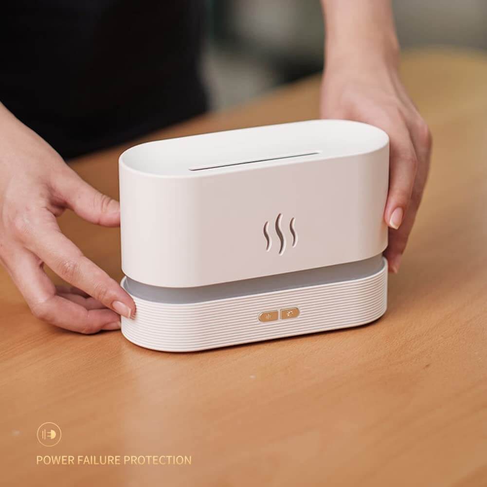 Innovativ flamme-aromadiffuser for essensielle oljer; forbedrer luftkvalitet og gir koselig belysning.