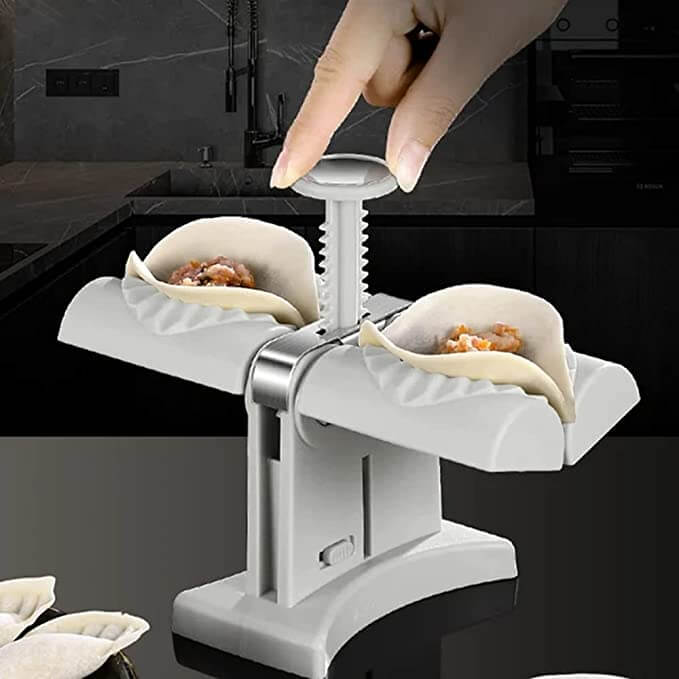 Enkel å bruke dumplingformer i rustfritt stål. Lag perfekte dumplings raskt med dette kjøkkenhjelpemiddelet.