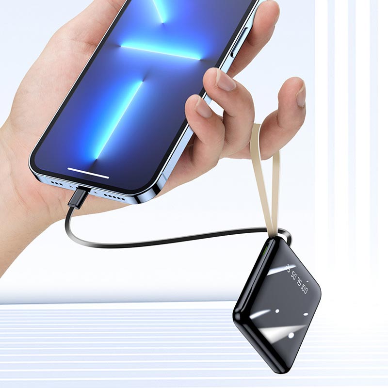 Lad mobilen raskt med denne 20000mAh bærbare powerbanken med smarte integrerte kabler.