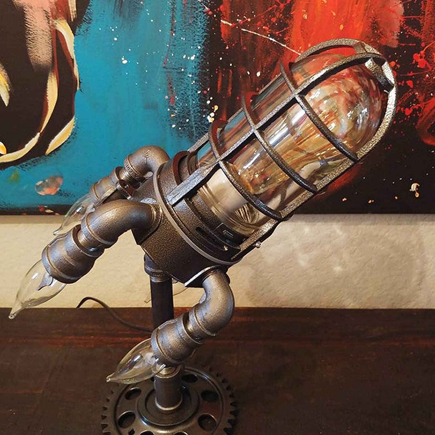 Elegant Steampunk Rakettlampe i metall, ideell som bordlampe og gave for barn med interesse for teknologi.