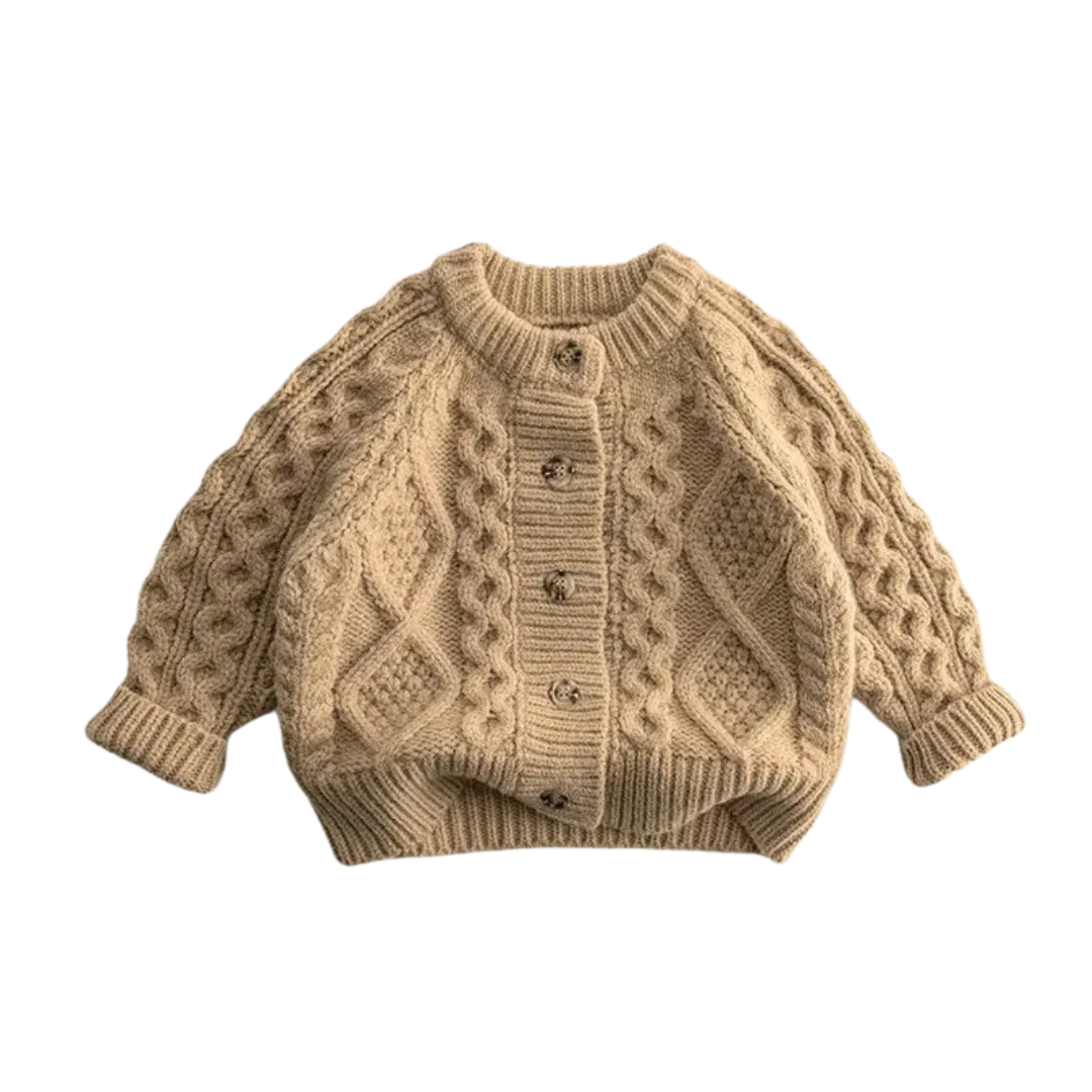 Beige strikket barnegenser, myk og varm, perfekt for aktive dager og koselig lek.