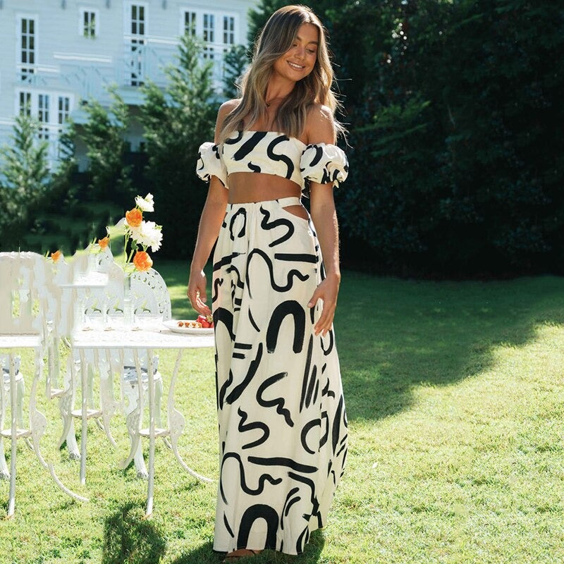 Elegant bohemsk crop topp fra todelt sommersett for kvinner. Lett og luftig, ideell for varmt vær.