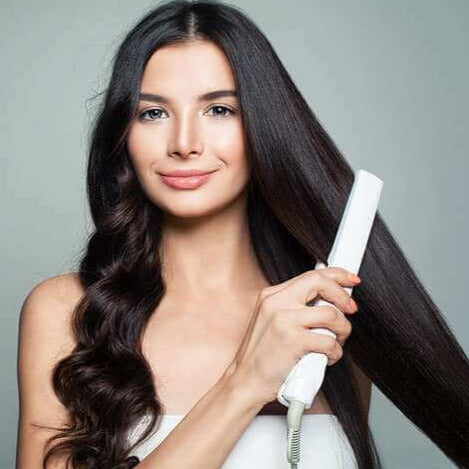 Rosa hårjern for dame. Bruk den som rettetang eller krølltang for allsidig og rask hårstyling.