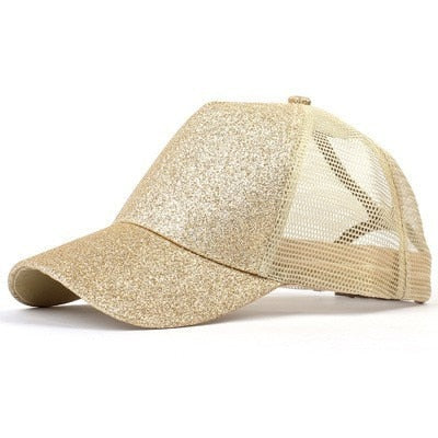 Dame baseballcaps som kombinerer stil og komfort for rotete bolle og hestehale.