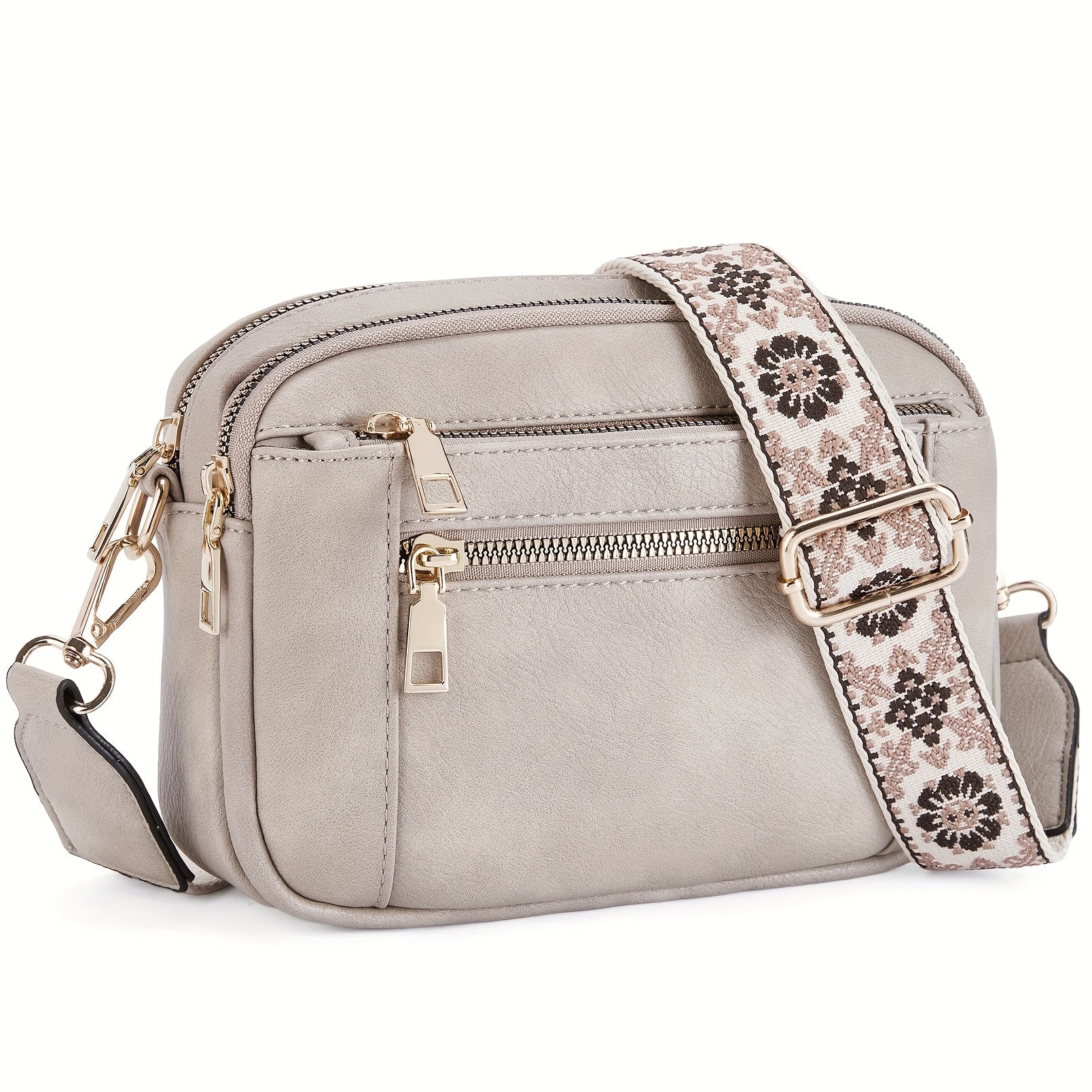 Praktisk dame skulderveske med justerbar stropp. Stilig crossbody veske for daglig bruk i boho stil.