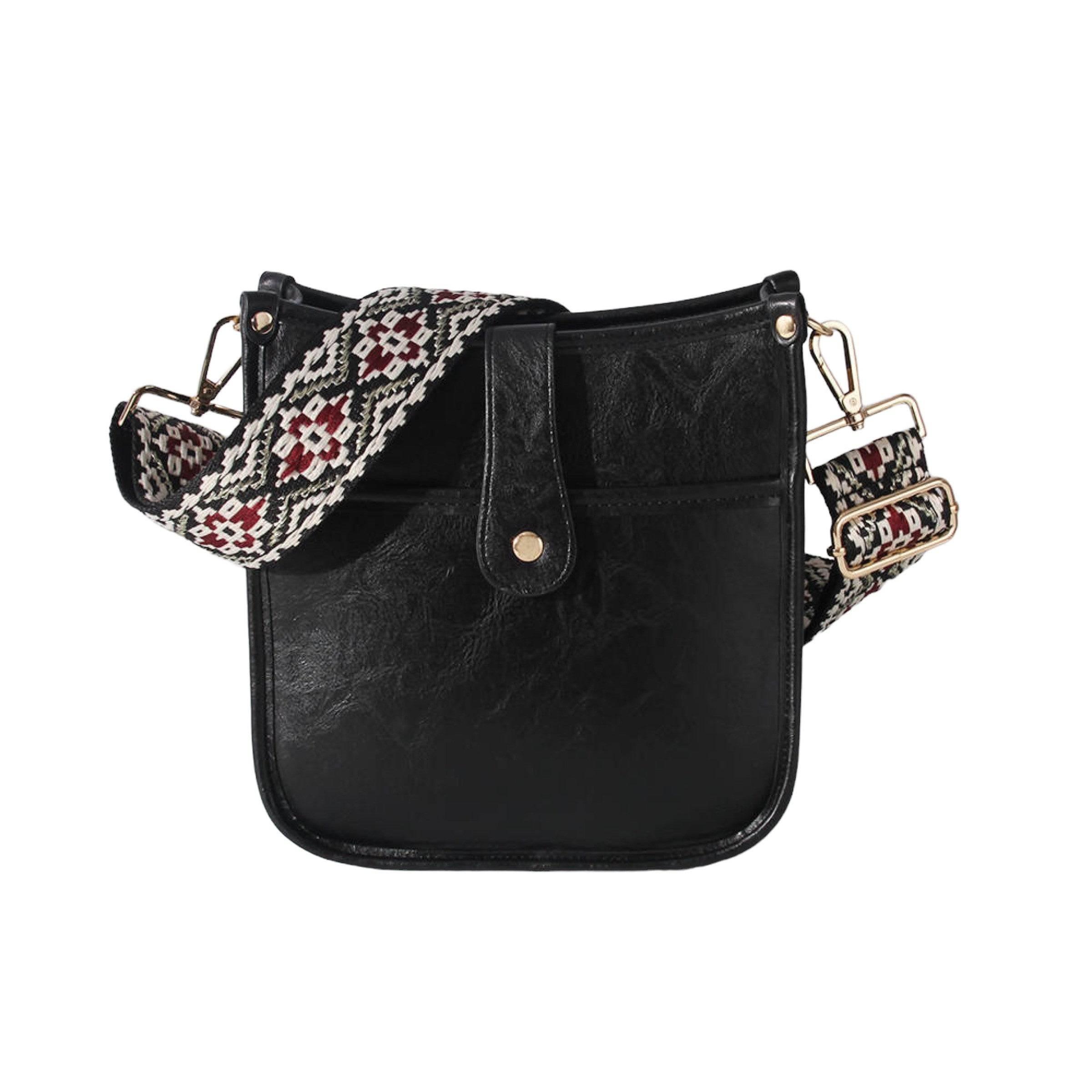 Moderne dameveske i vegansk skinn. Kompakt crossbody med komfortabel og justerbar gitarsnor.