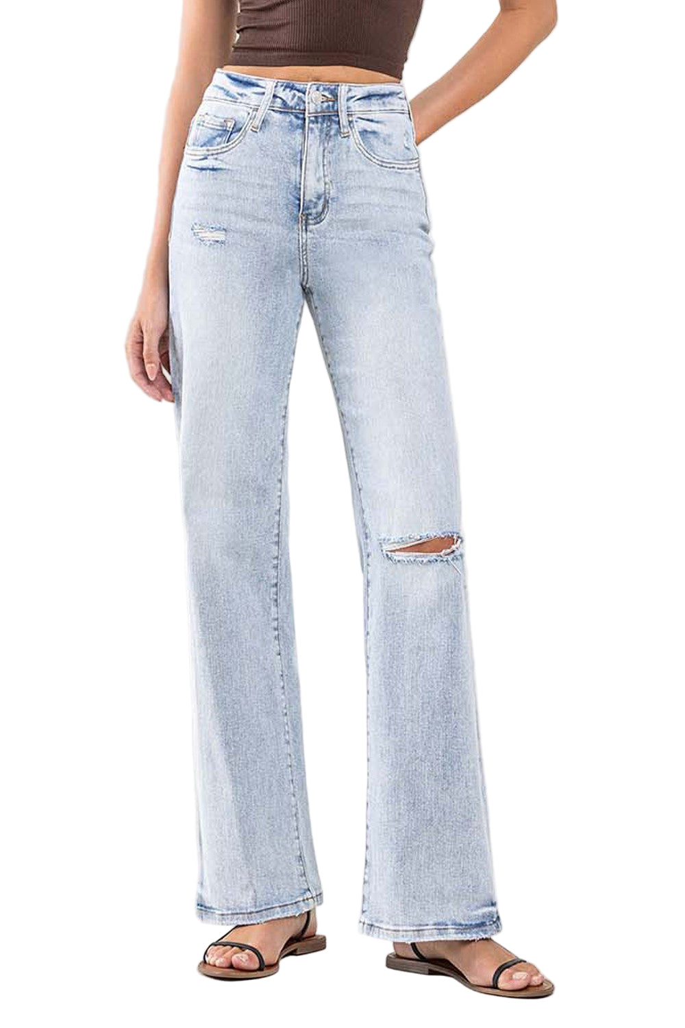 Dame flare jeans med høy midje i lys vask, vintage 90-talls stil. Komfortable, trendy hverdagsjeans for kvinner.