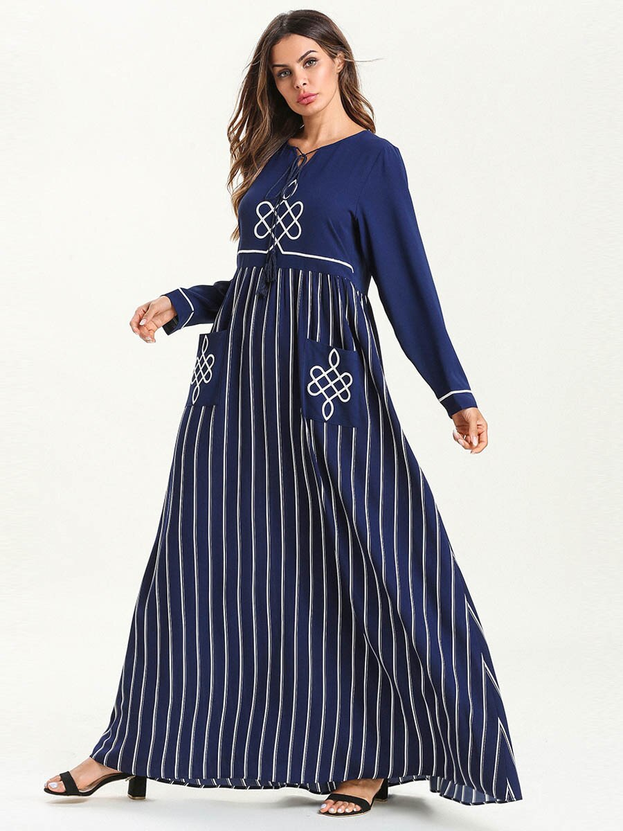 Langermet kaftan maxikjole for dame. Komfortabel, løs og elegant for sommerdager, ferie og strand.