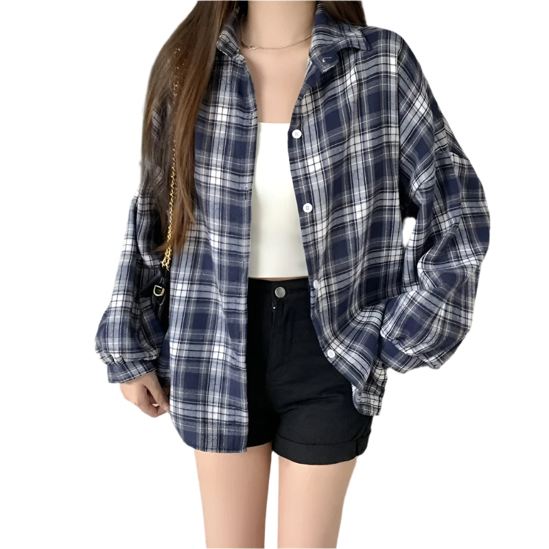 Komfortabel langermet overdimensjonert rutete dameskjorte. Perfekt for en casual og stilfull look.