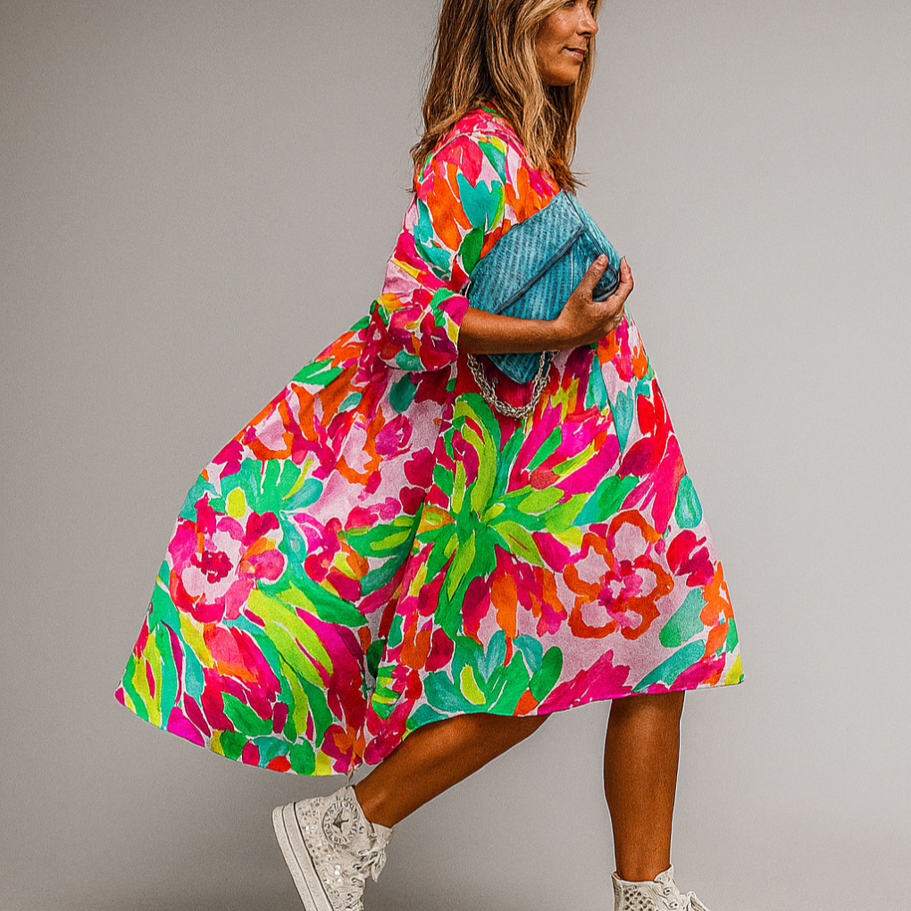 Dame oversized midi skjortekjole med fargerikt blomstertrykk og puffermer, perfekt for sommer.