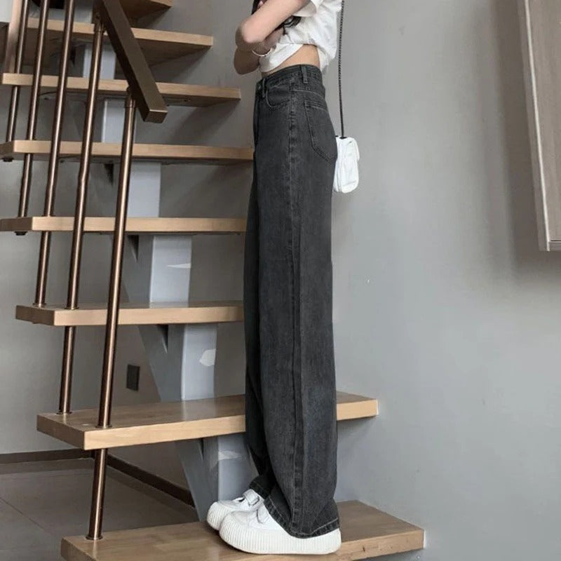 Elegante vintage damejeans med vide ben, høy midje og klassisk denim.