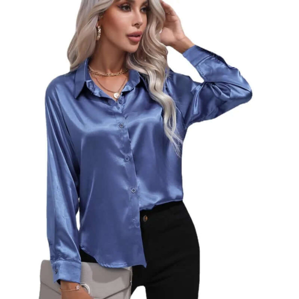 Komfortabel løs damebluse med lange ermer. Perfekt for en avslappet, men chic look.