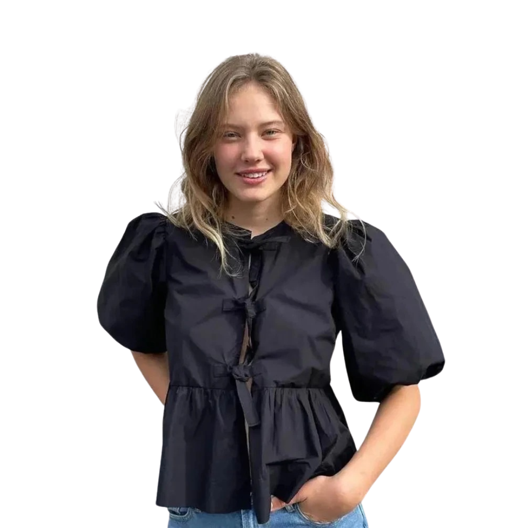 Stilig damebluse med puffermer, snøring. Mote for en elegant og komfortabel fritidslook.
