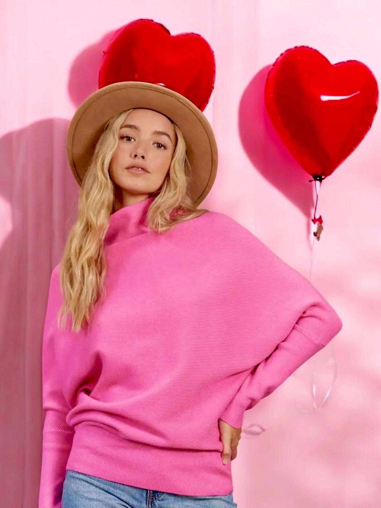 Avslappet pullover damegenser med slouchhals og dolmanermer. Komfortabel og oversized for vinterbruk.