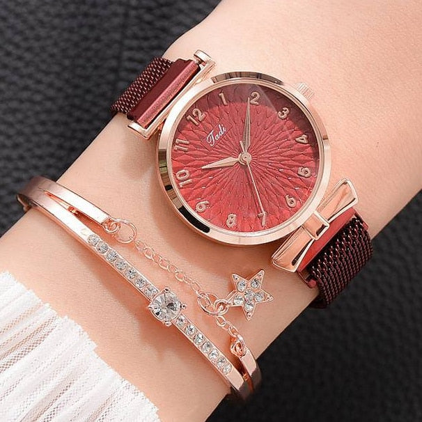 Raffinert dameklokke med gnistrende glitter og behagelig magnetrem. Et must-have tilbehør.