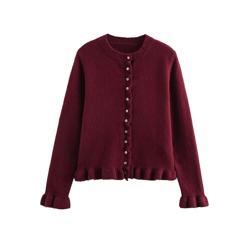 Modell iført en dame cardigan i strukturstrikk, avslappet og elegant look