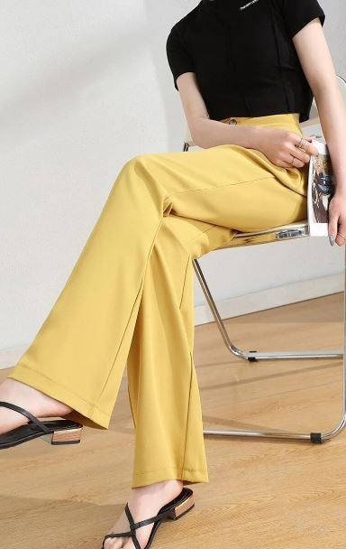 Rückenansicht einer Frau in Damen Ultimate Weite Hose, hohe Taille betont Silhouette, bequemer Sitz